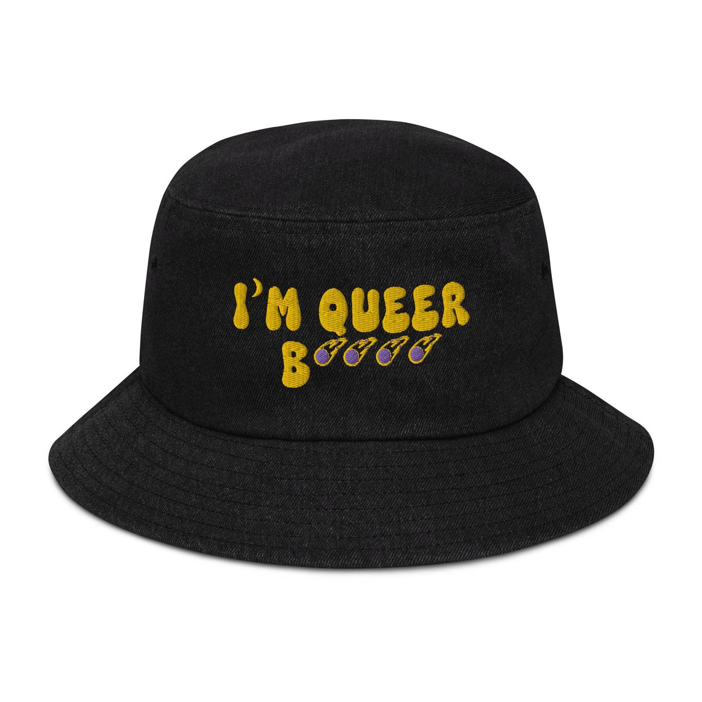 Front view of queer identity bucket hat with golden embroidery and comet asterisks.