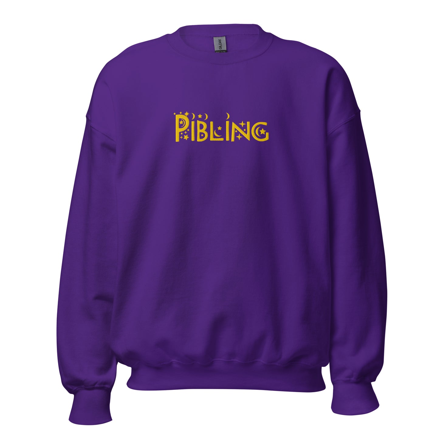 Unisex purple crewneck with “Pibling” embroidered across the chest in gold thread; inclusive design by Galactic Flow