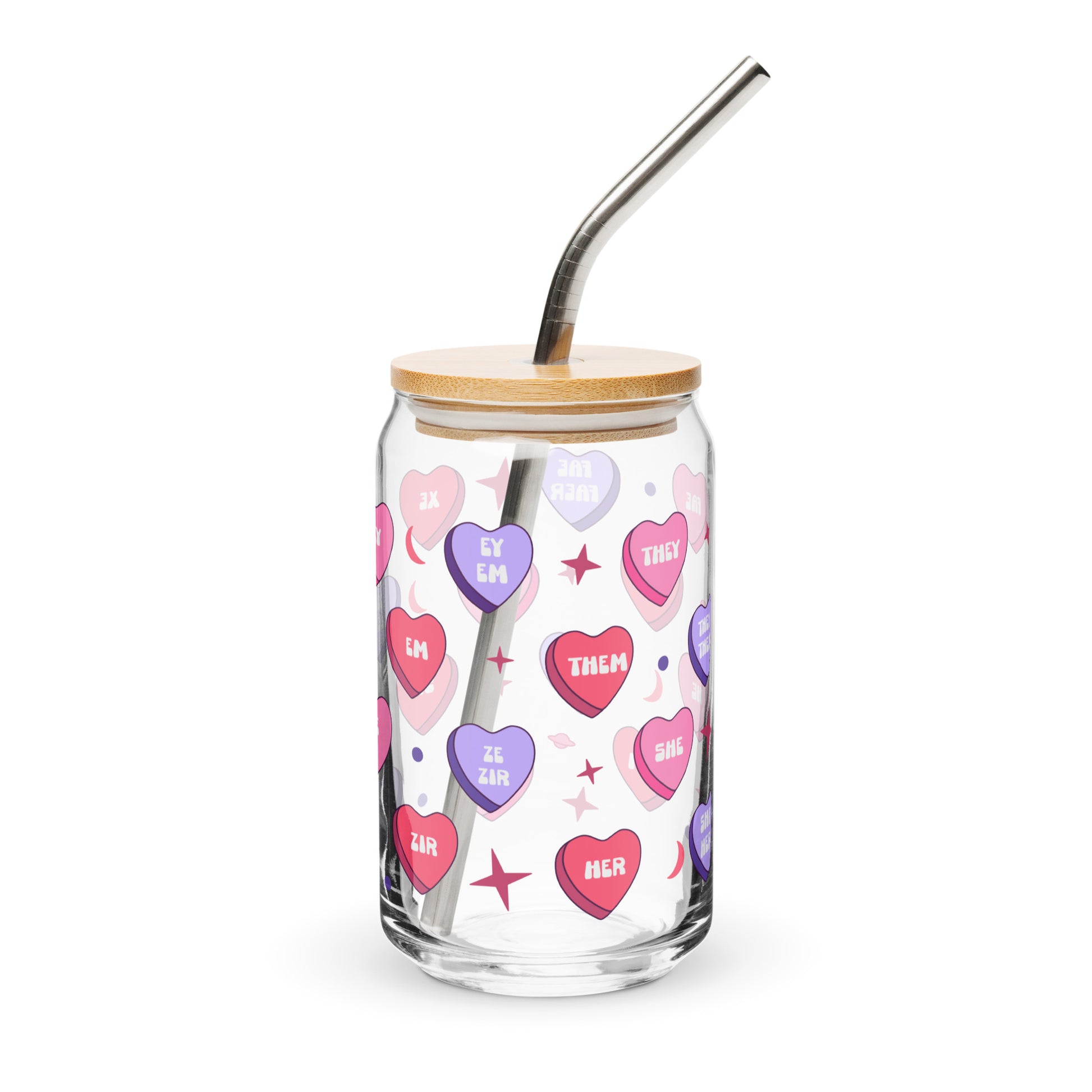 Glass tumbler with colorful heart-shaped text, wooden lid, and metal straw on a white background