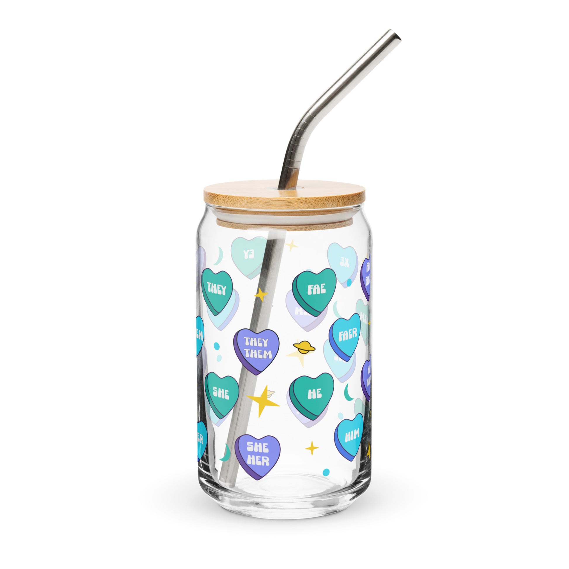 Glass tumbler with colorful heart-shaped text, wooden lid, and metal straw on a white background
