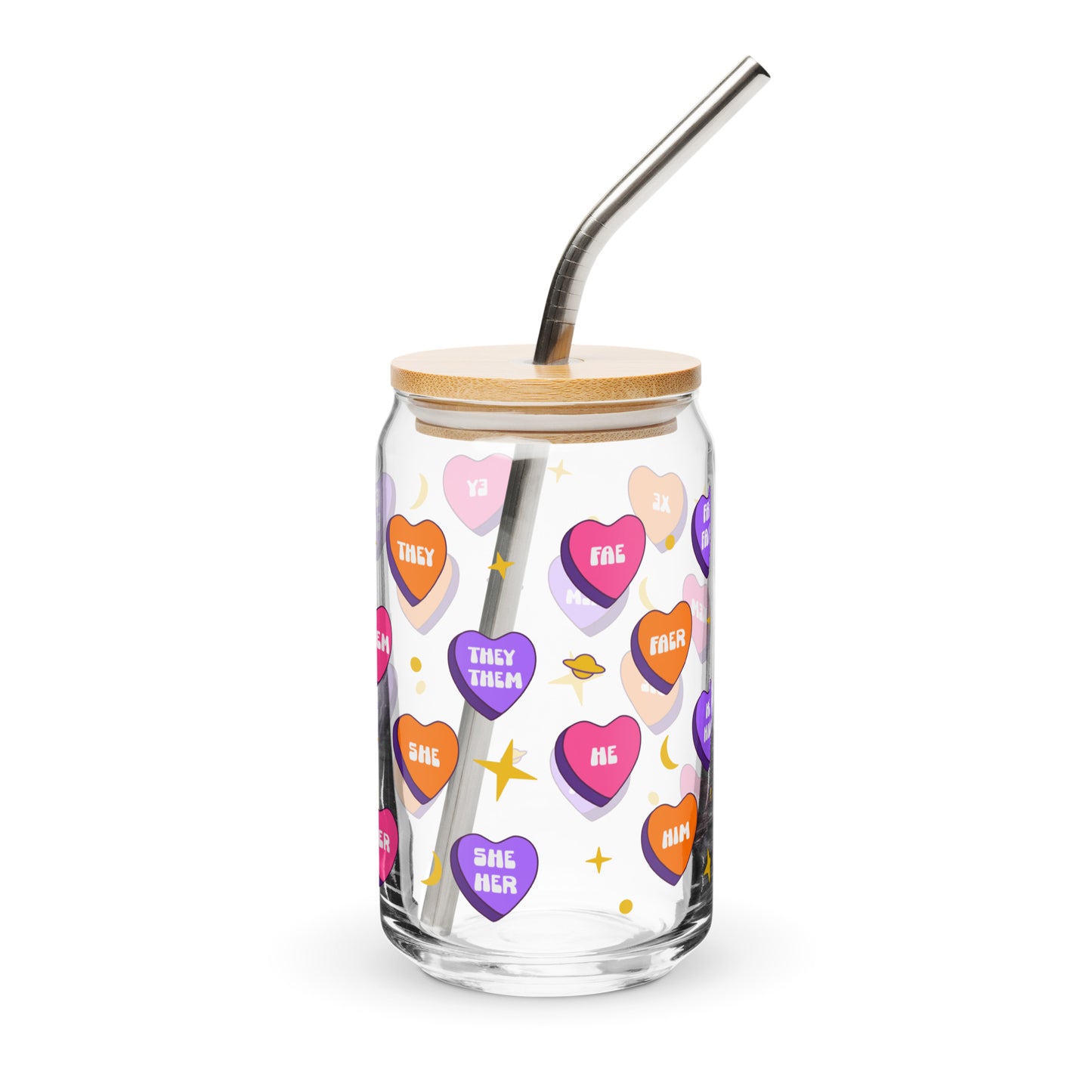 Glass tumbler with colorful heart-shaped text, wooden lid, and metal straw on a white background
