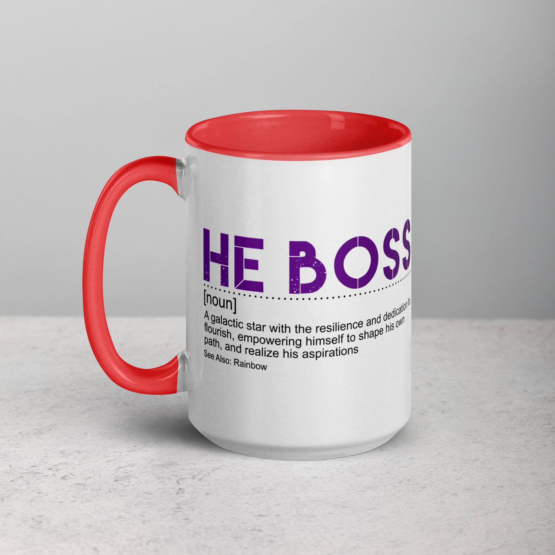 Mug with red handle and "he boss" in purple text on a gray background